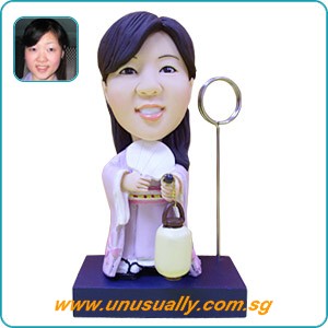Custom Caricature 3D Ms Osaka Figurine On Blue Memo Stand